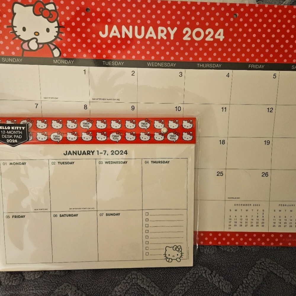 Hello Kitty 2024 Calendar Set. Desk pad in small and large in red.